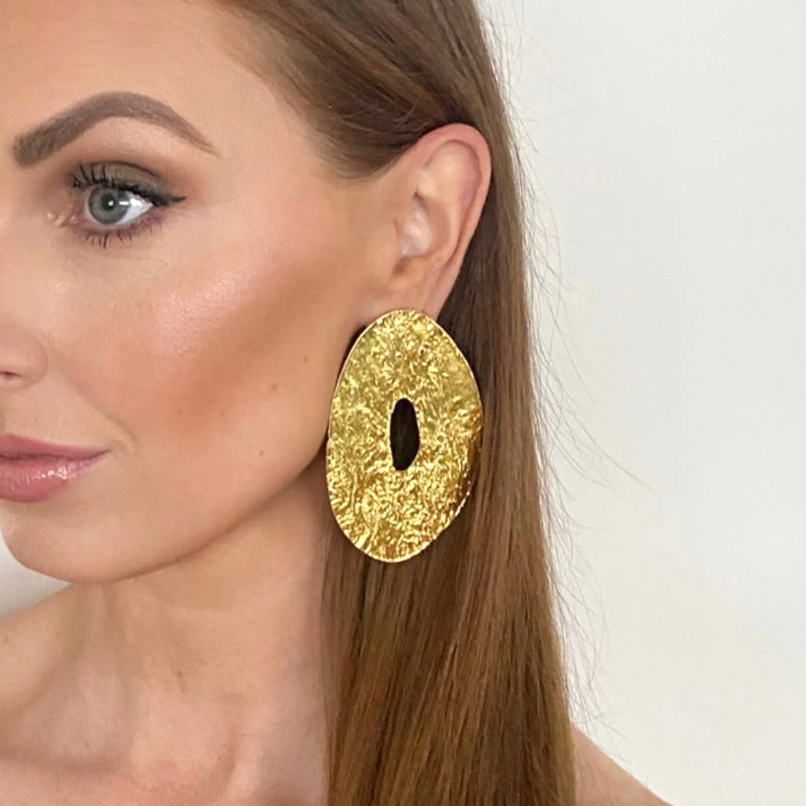 Opulent Oval Statement Gold Earrings