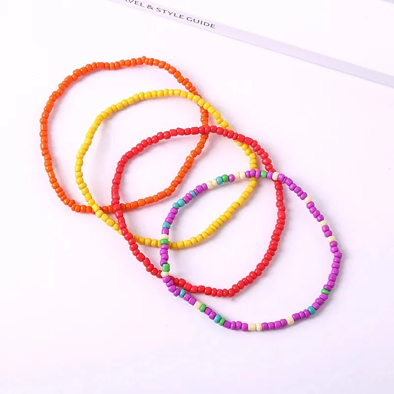 Set of Twelve Boho Colourful Rice Bead Anklets